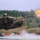 Illustration for article titled Flying tank fires its cannon